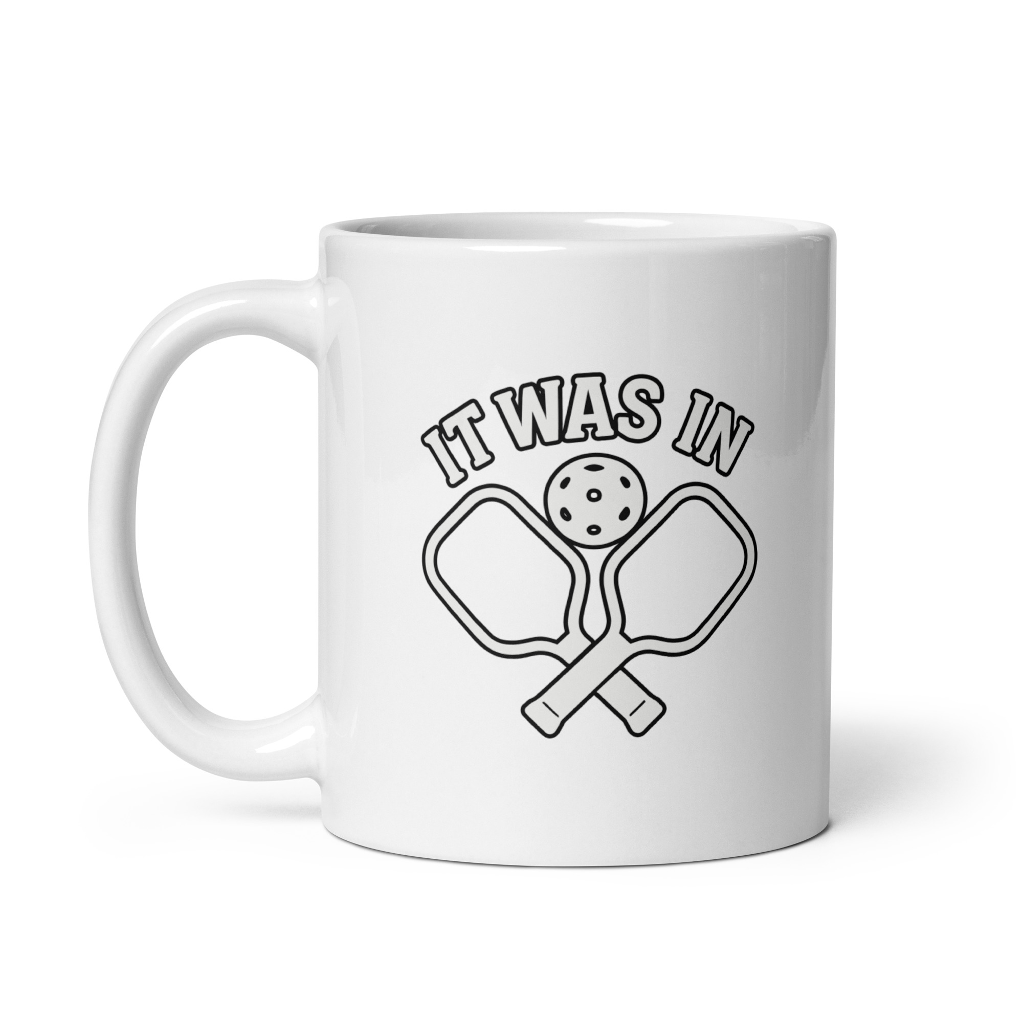 white-glossy-mug-white-11-oz-handle-on-left-68f6224c2f3ba.jpg Pickleball mug with paddles and text design.