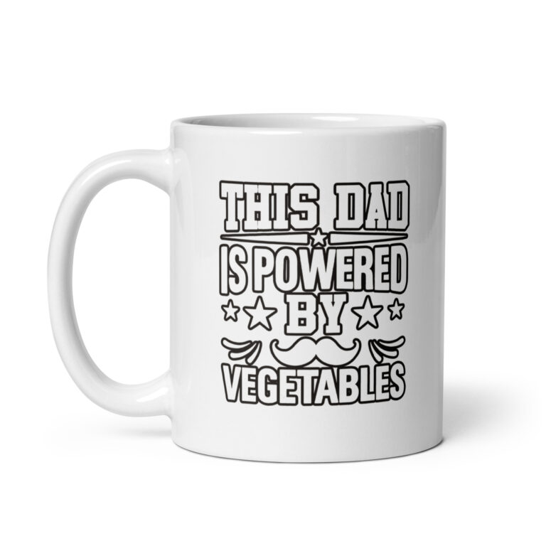 White mug with 'Powered by Vegetables' text.