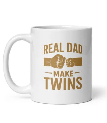 White mug with 'Real Dad Make Twins' slogan.