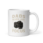 White mug with camera design and dad quote.