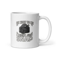 Photographer-themed mug with humorous camera graphic.