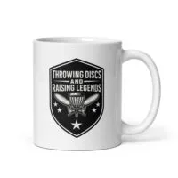 White mug with disc golf design and text.