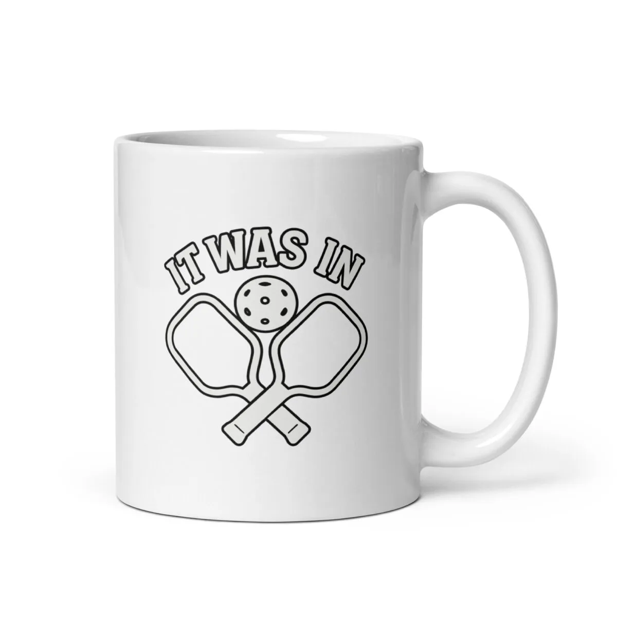 Pickleball mug with paddles and ball design.