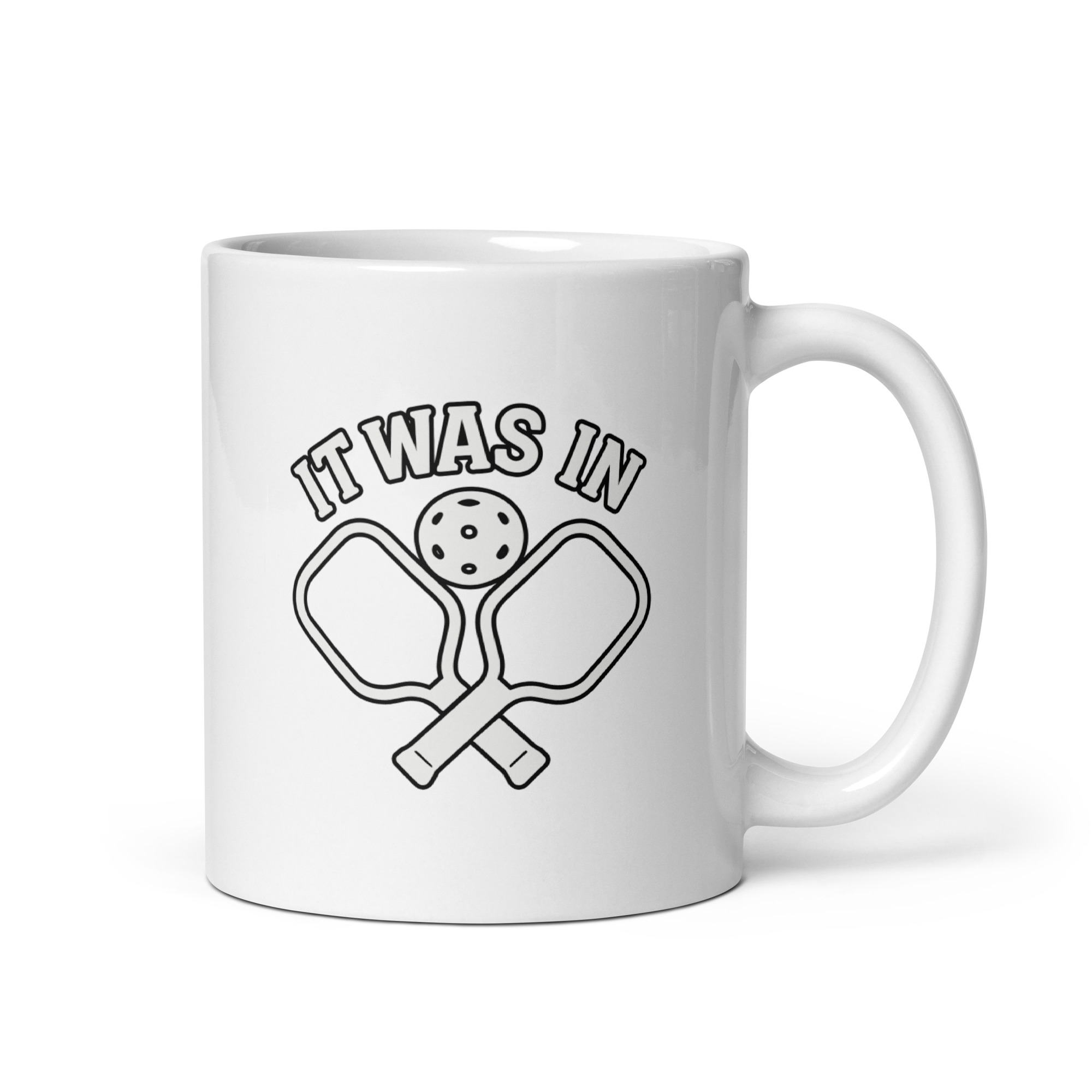 white-glossy-mug-white-11-oz-handle-on-right-68f6224c2e9f9.jpg Pickleball mug with paddles and ball design.