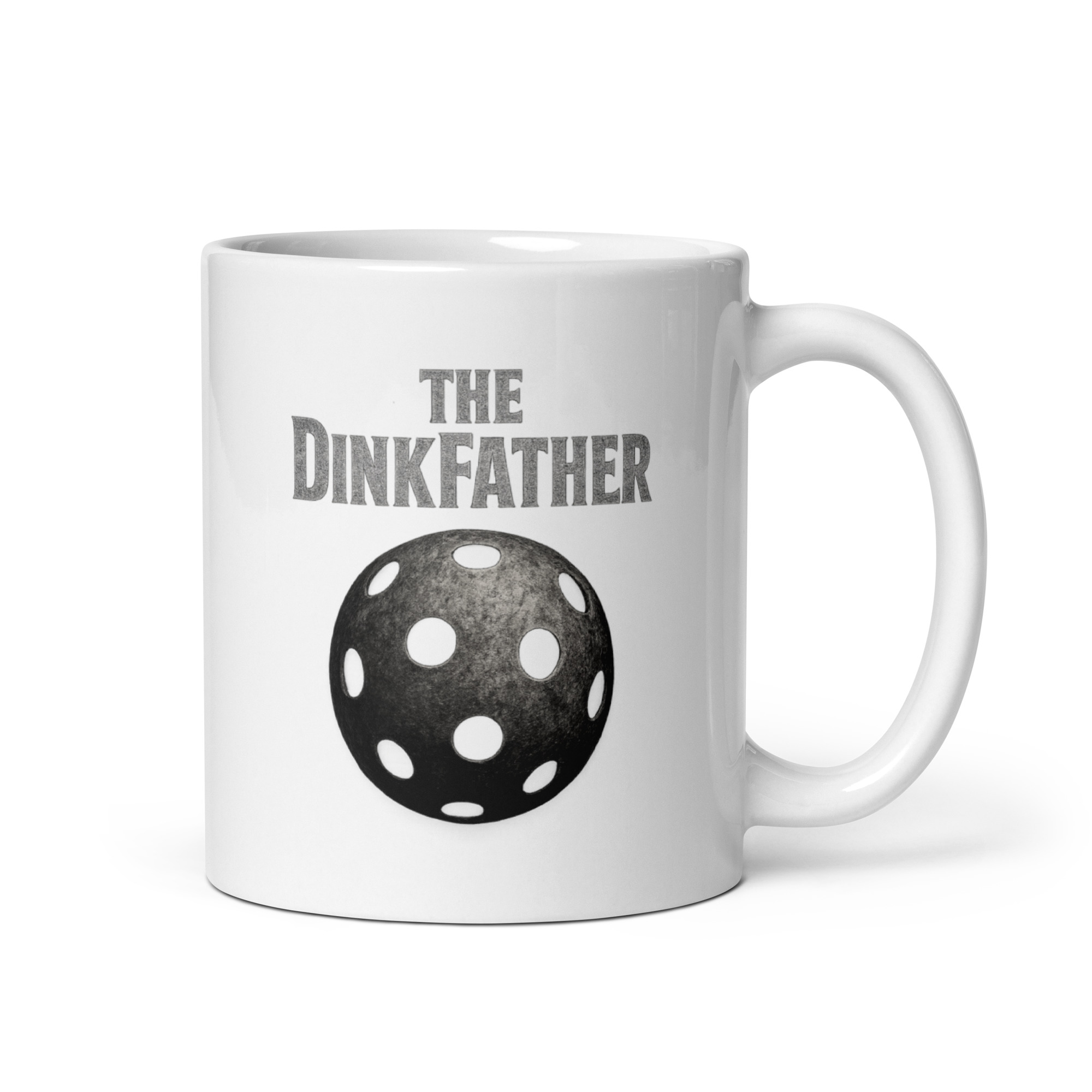 white-glossy-mug-white-11-oz-handle-on-right-68f6245a8ad0f.jpg Mug with 'The Dinkfather' and pickleball design.