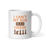 Chess-themed mug with humorous text and pieces.
