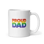 White mug with rainbow 'Proud Dad' text.