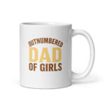 White mug with 'Outnumbered Dad of Girls' text