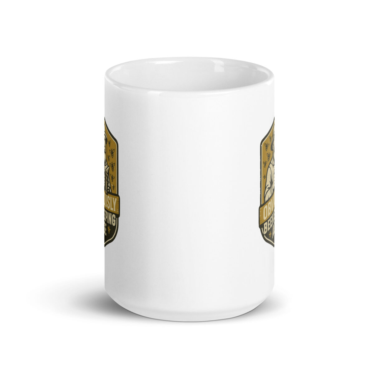 White mug with golden badge design