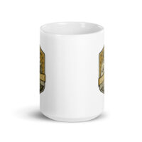 White mug with golden badge design