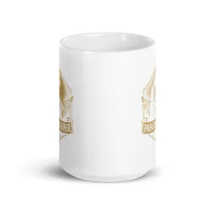 White mug with golden vintage print design.