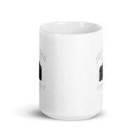 White mug with camera design and text