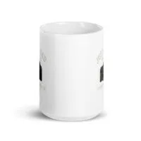 White mug with camera design and text