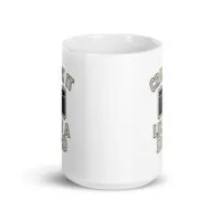White mug with amp design and text