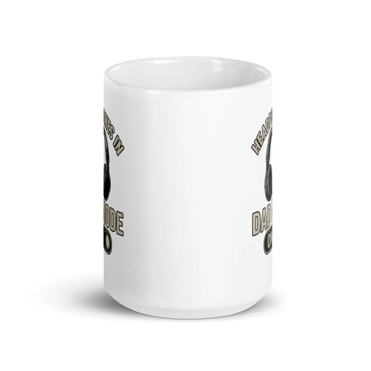 White mug with headphones design and text