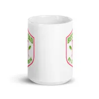 White mug with gardening-themed graphic design