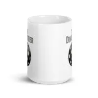 White mug with dinosaur egg illustration
