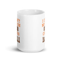 White ceramic mug with chess-themed design.
