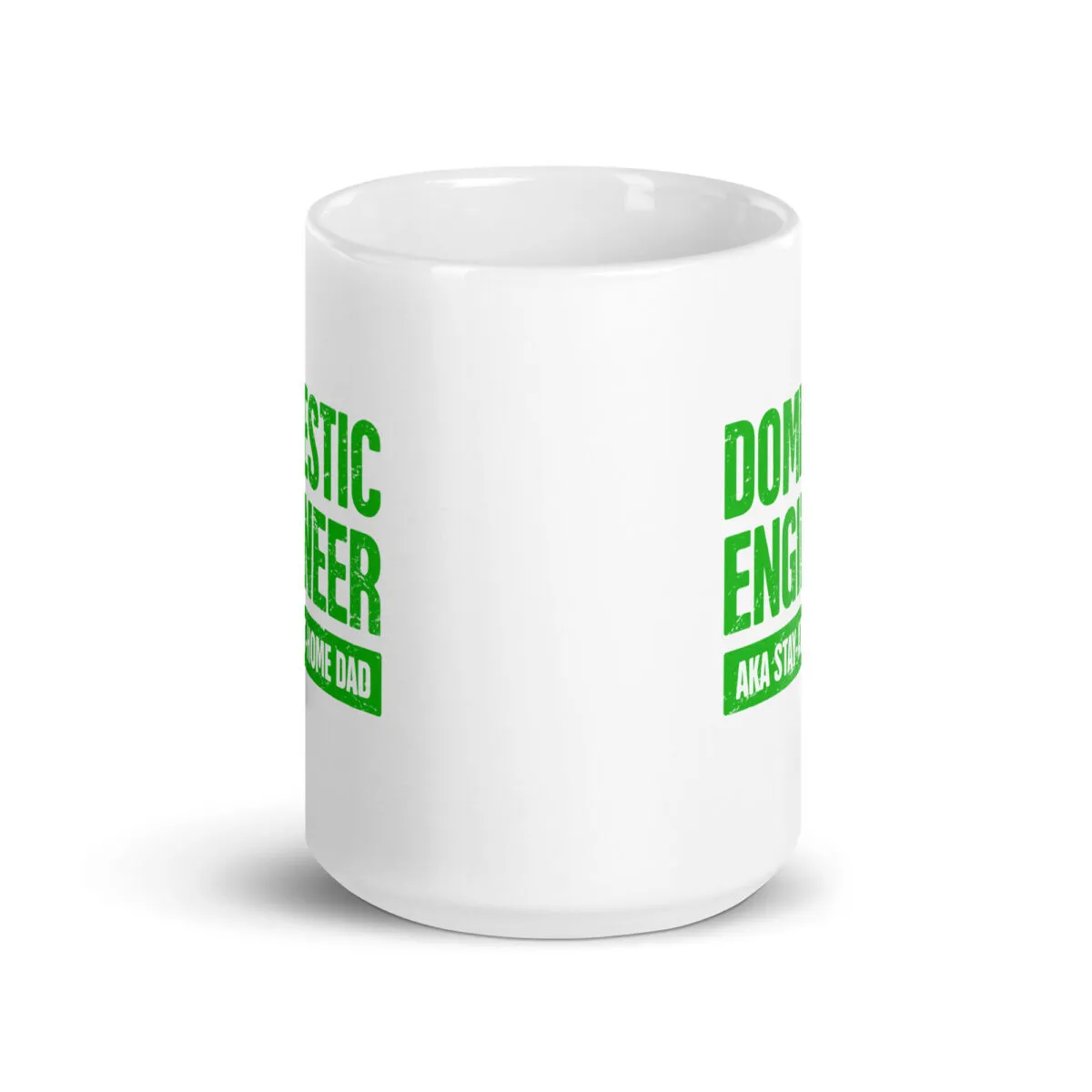 White mug with 'Domestic Engineer' text in green.