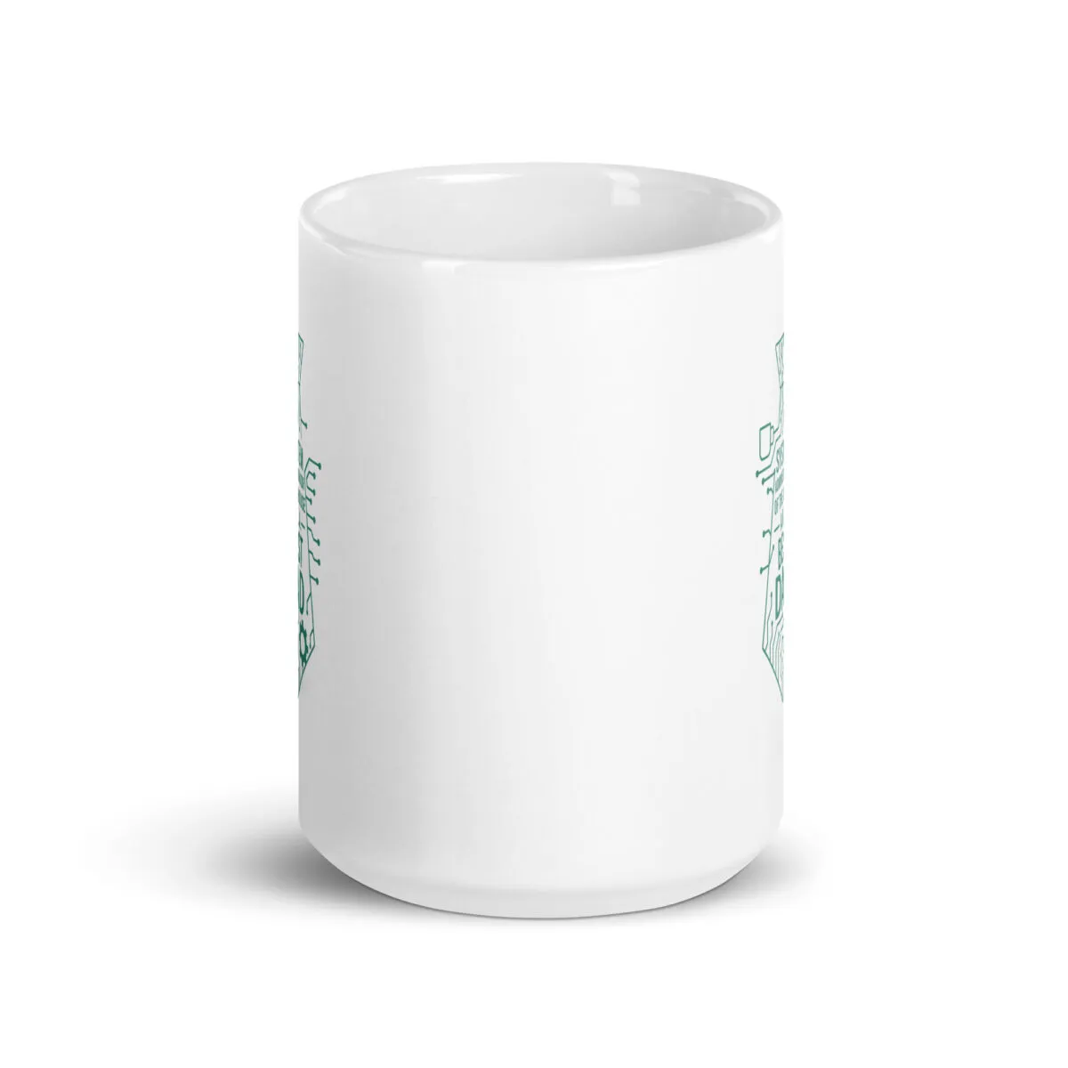 White mug with green geometric design