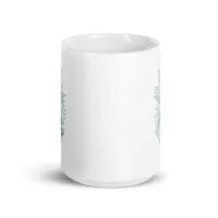 White mug with green geometric design