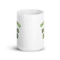 White mug with green text design