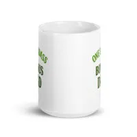 White mug with green text design