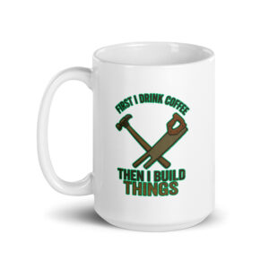 Coffee mug with hammer and saw design.