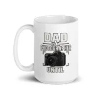 White mug with dad photographer design.