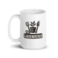 White mug with gardening design and text.