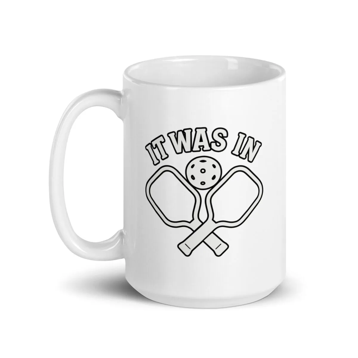 Pickleball-themed mug with paddles design.