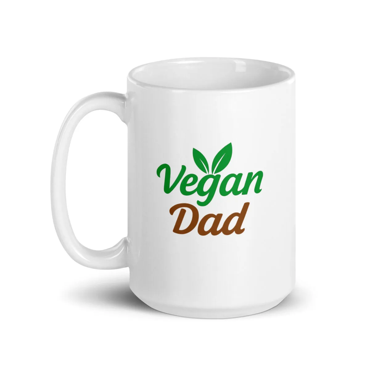 White mug with 'Vegan Dad' in green, brown text.