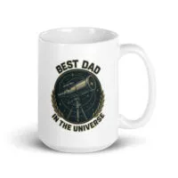 White mug with 'Best Dad in the Universe' design.