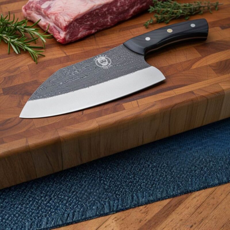 Chef's knife on wooden cutting board with herbs.