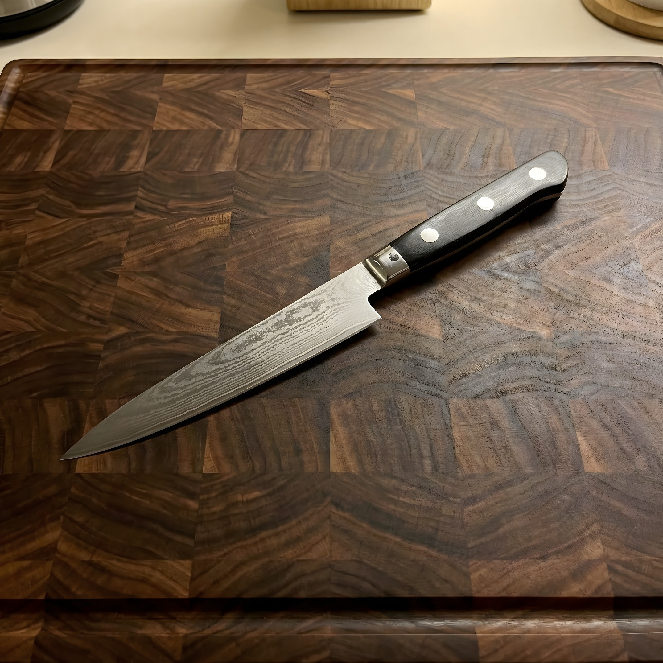 Chef's knife on wooden cutting board.