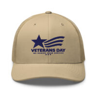 Tan Veterans Day trucker hat with blue embroidered logo