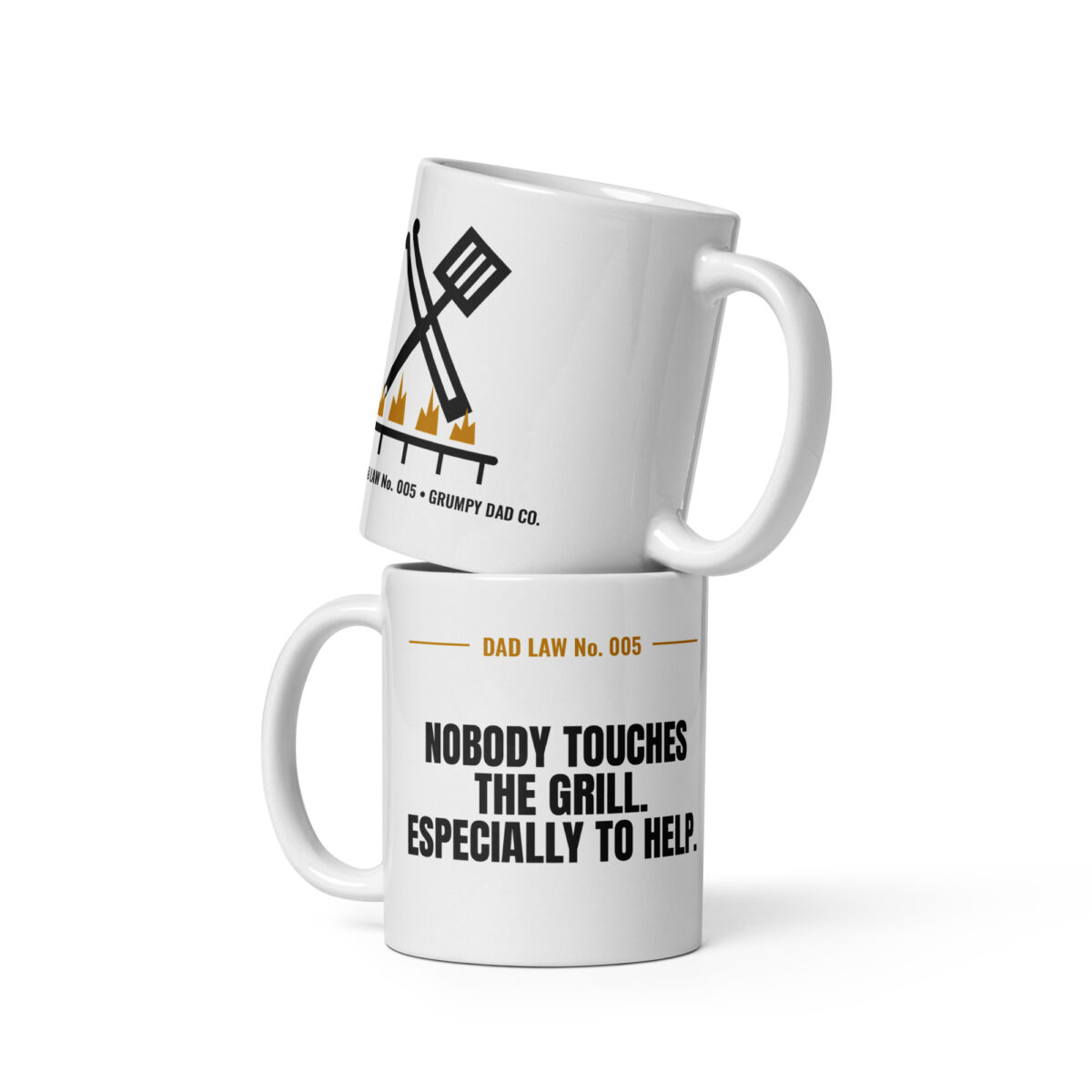 Stacked white mugs with humorous Dad Law grilling design