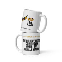 Stacked white mugs with humorous dad holiday-light designs