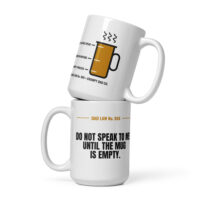Two white Dad Law coffee mugs stacked together
