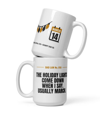 Two white Dad Law mugs stacked with humorous prints