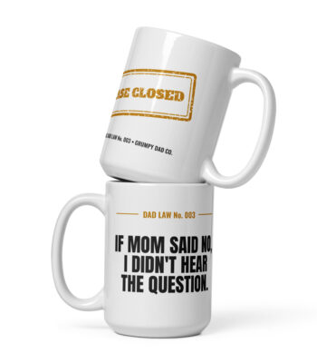 Two white humorous dad-law coffee mugs stacked together